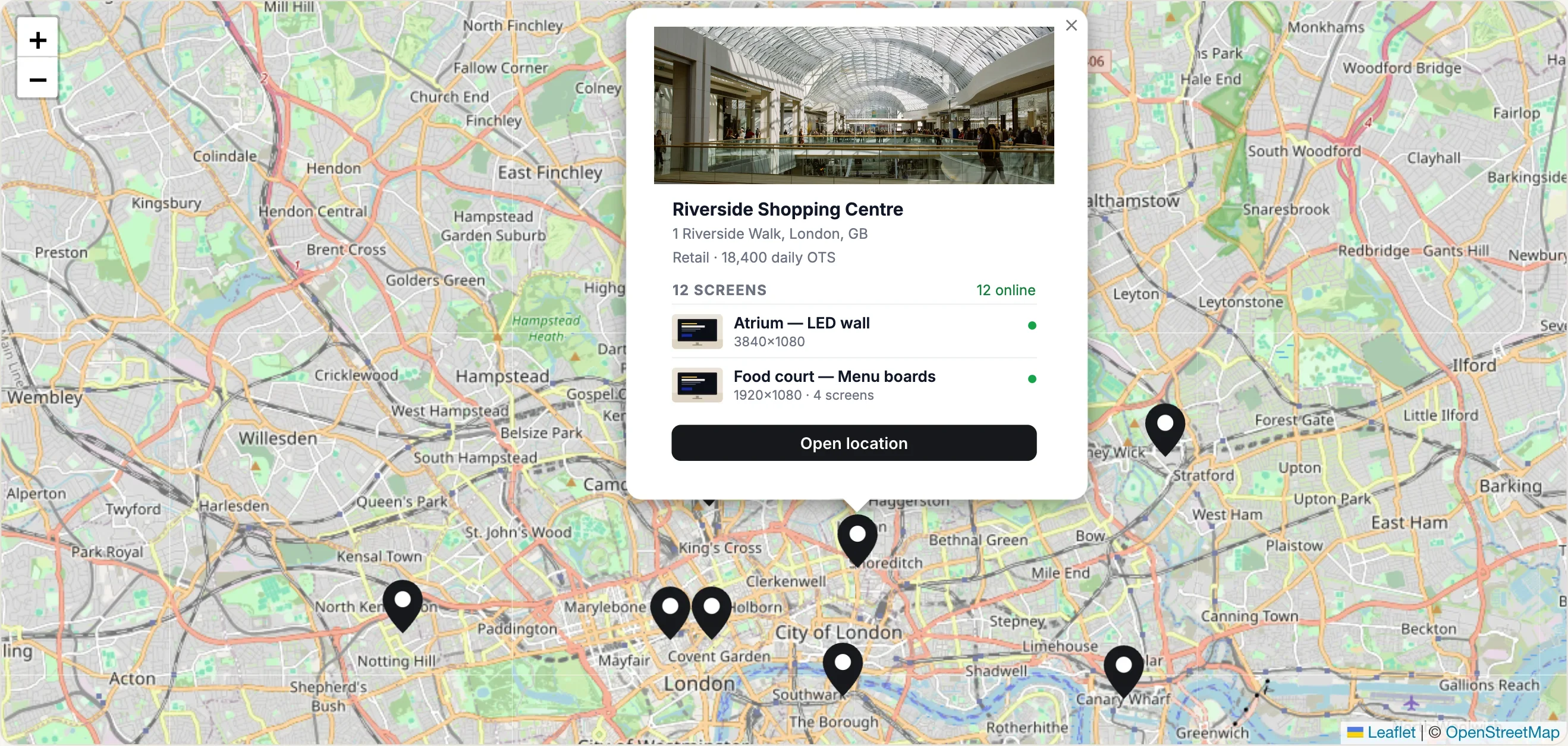 Map of London with a retail network's sites pinned; the Riverside Shopping Centre card is open, showing its twelve screens online